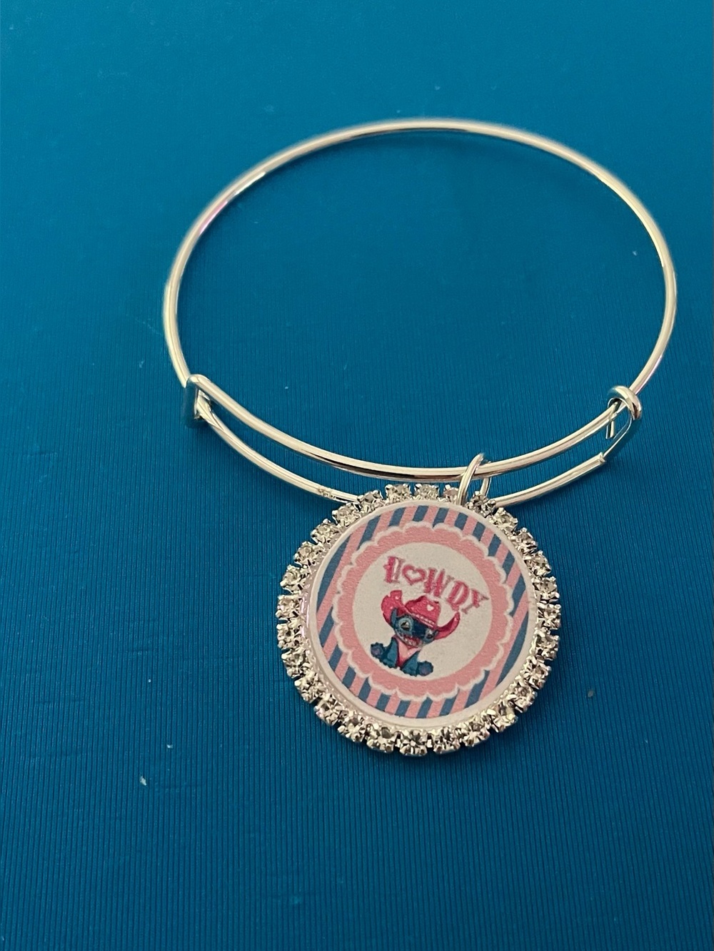 Silver Bangle Bracelet with Pink 'Howdy' Charm